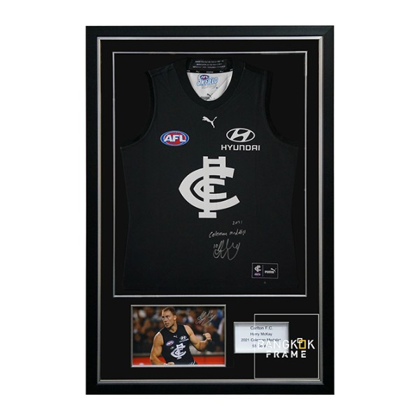 กรอบรูปโชว์เสื้อที่ระลึก